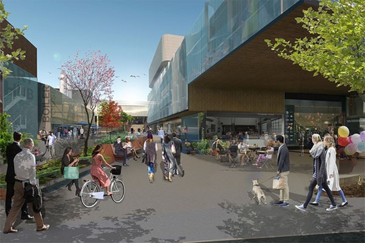 Vision of the Tonsley retail development site in rendered image format. People walking and cycling on a public pathway lined with trees and bench space on the left, and retail spaces on the right.